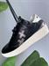 sneakers in pelle nera con sula interna rialzata