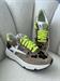 Sneakers camoscop con suola rialzata e cavallino animalier