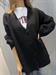 Cardigan nero lungo con scritta dietro